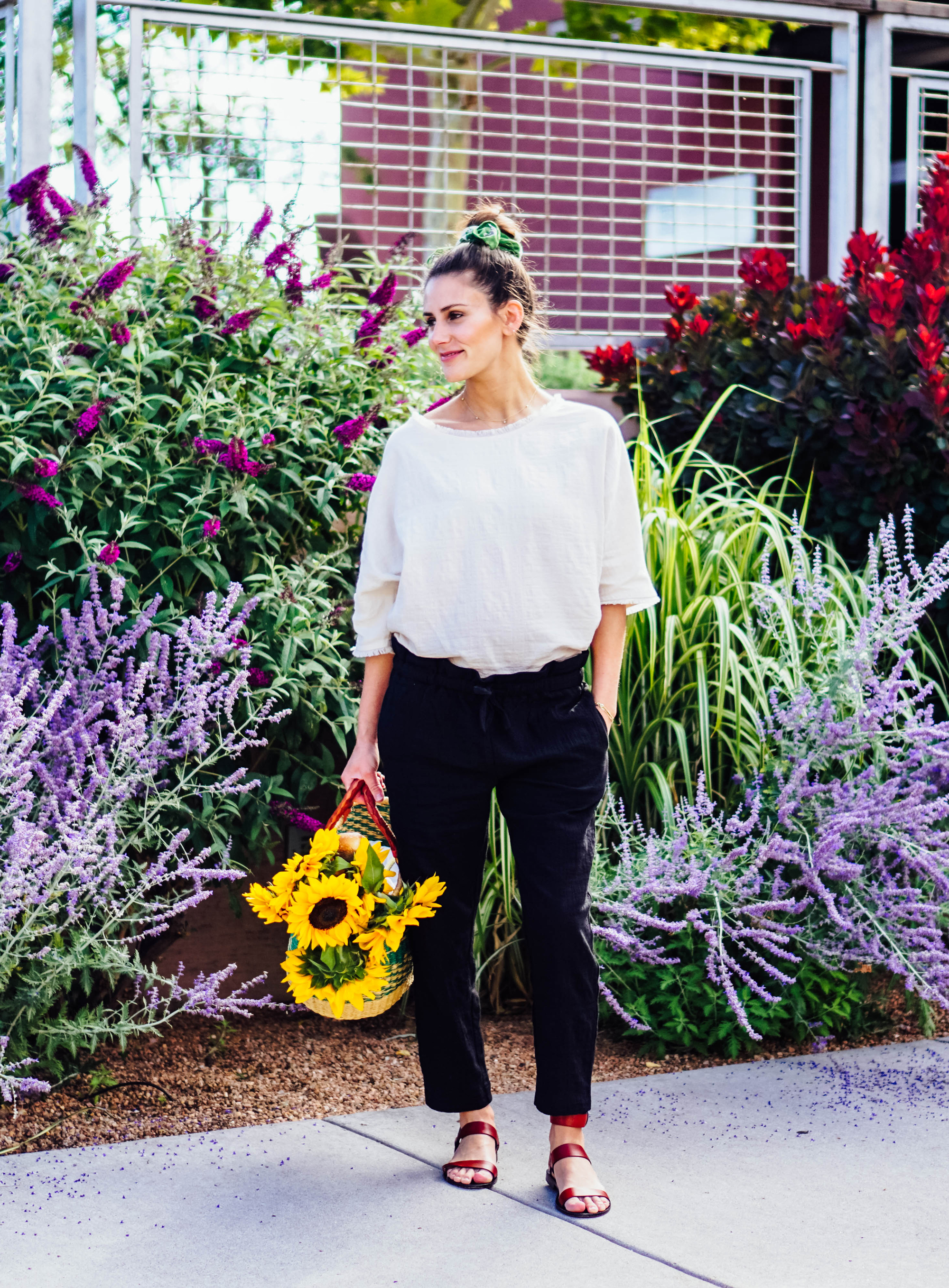 I'm exploring the Santa Fe Farmer's Market and the famous Cathedral Basilica of St. Francis of Assisi in some of my favorite maternity pieces from hatch collection over on The Dandy Liar, including this comfortable black jumper, and these extra forgiving paperbag waist pants and linen top.