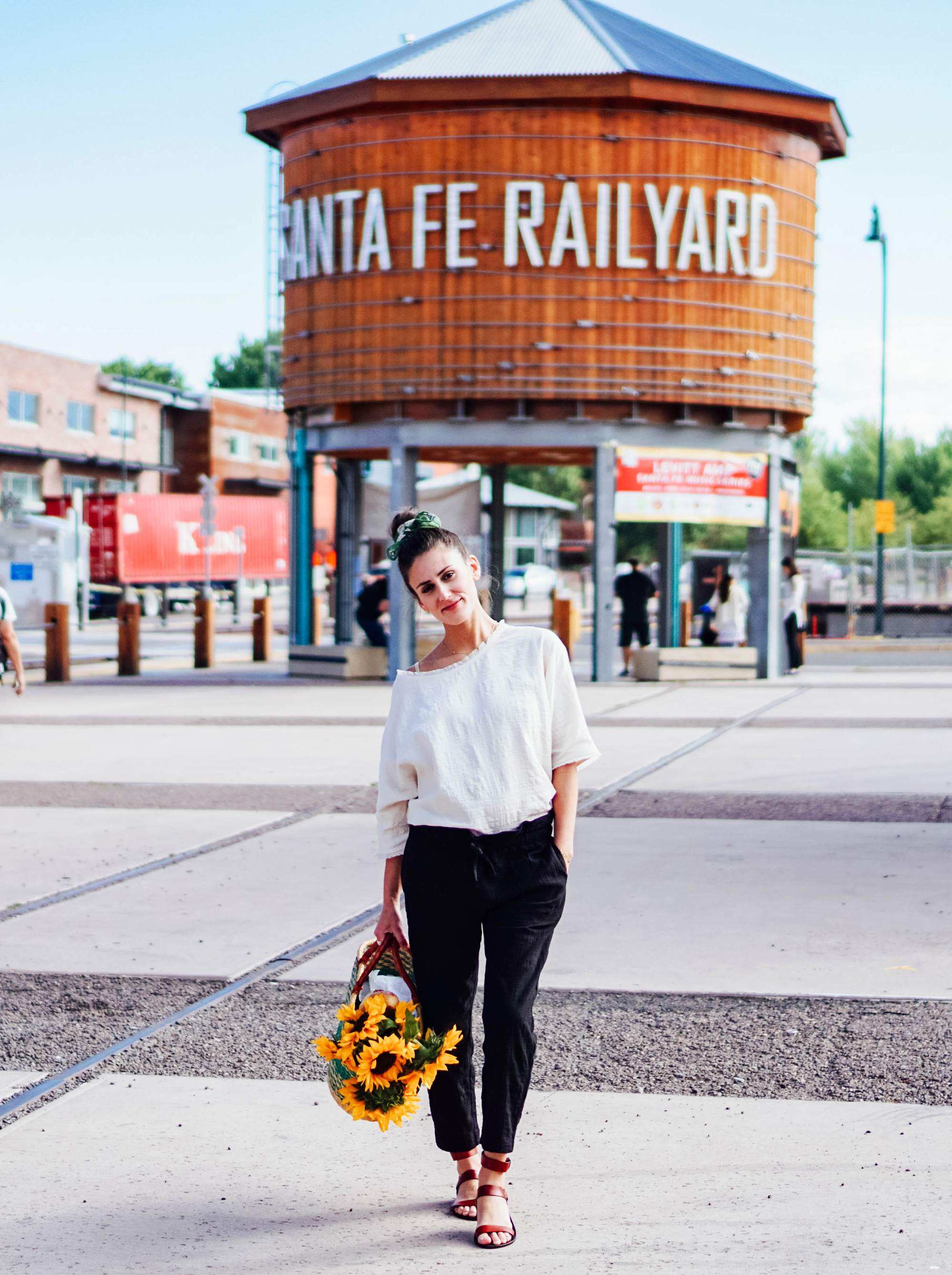 I'm exploring the Santa Fe Farmer's Market and the famous Cathedral Basilica of St. Francis of Assisi in some of my favorite maternity pieces from hatch collection over on The Dandy Liar, including this comfortable black jumper, and these extra forgiving paperbag waist pants and linen top.