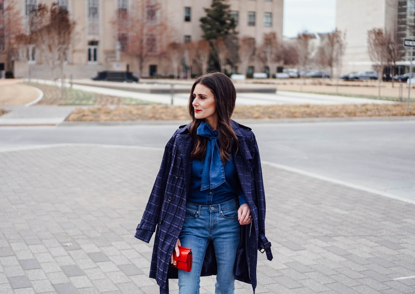 I'm over on TheDandyLiar.com talking about denim. I'm loving this new pair I bought from Banana Republic that has a frayed hem and fits in all the right places. I also paired it with a denim bow tie top and navy plaid trench coat.